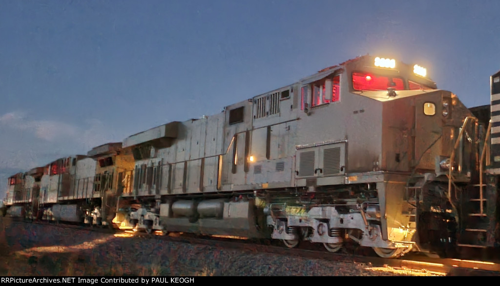 BNSF 3283 laced to 2 C44ACM's on the Side Storage Track For Their About to Be Remodeled Locomotives. 